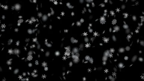 White snowflakes falling gently against a dark black winter sky Vídeo Stock 344689413