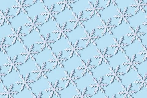 White snowflakes pattern on a blue background Foto stock