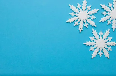 White snowflakes in shape frame Stock Photos