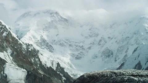 White Snowy Peaks Among The Clouds Stock Footage 159655804