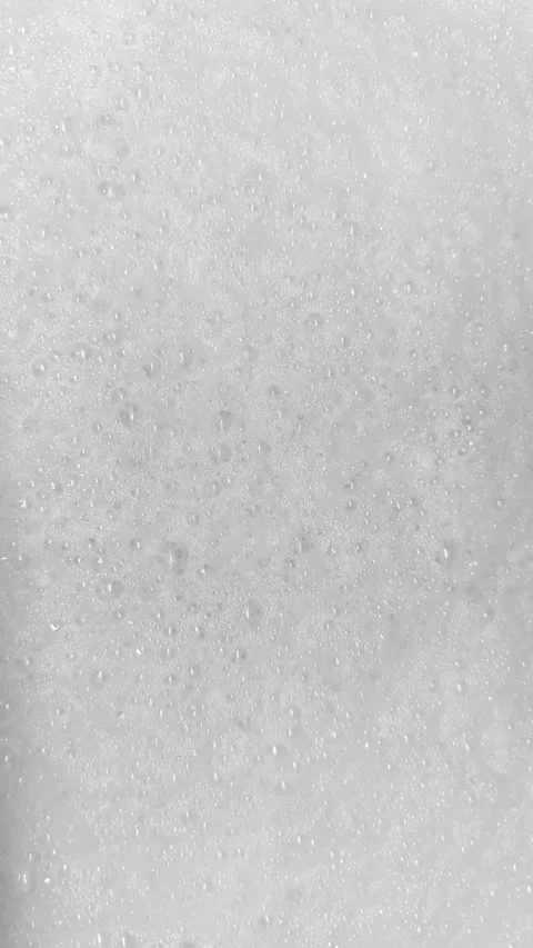White soap bubbles foaming detergent texture asmr sound vertical footage Stock Footage 246871519