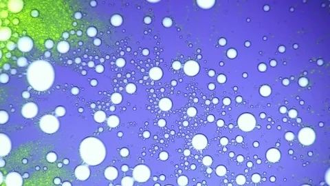 White soap bubbles moving in blue watter Stock Footage 124439538