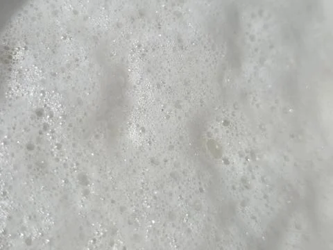 White soap foam texture in closeup view. Abstract bubbly surface for hygien.. Stock Photos