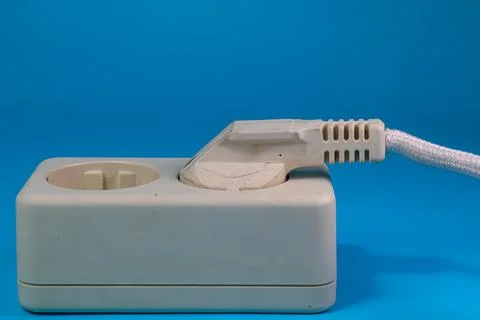 White socket on blue background Stock Photos