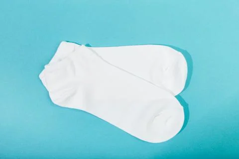 White socks on blue  background - Imagr Foto stock