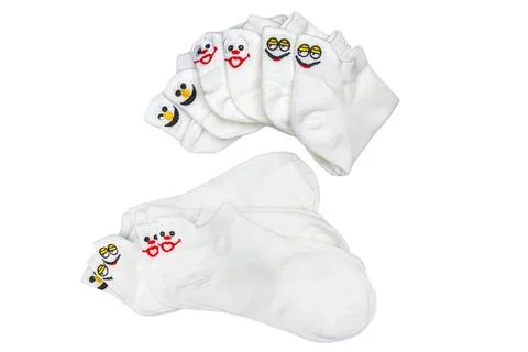 White socks with funny faces isolated on white background Stock Photos