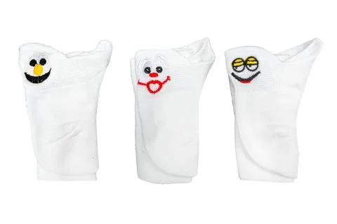 White socks with funny faces isolated on white background Stock Photos