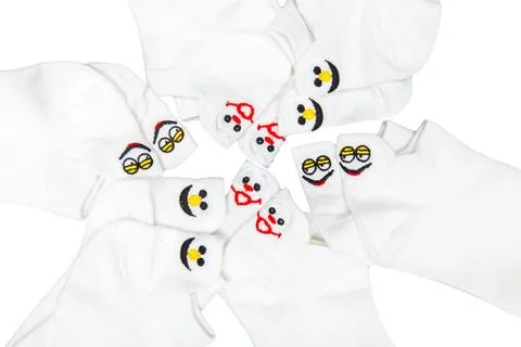 White socks with funny faces isolated on white background Stock Photos
