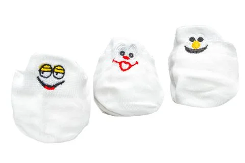 White socks with funny faces isolated on white background Stock Photos