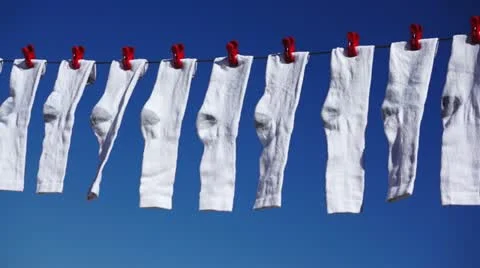 White Socks Hanging Dolly Stock Footage 21033839