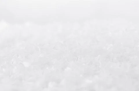 White soft light delicate abstract snow texture with snowflakes, closeup, blu Stock Photos