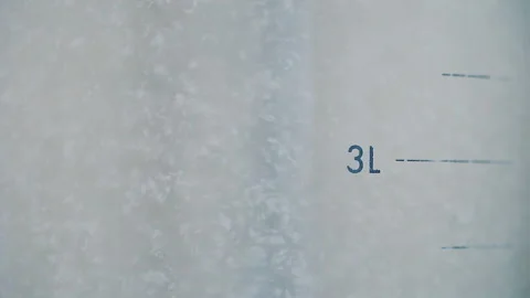 White solution in laboratory mixer machine extra close up slow motion Stock-Footage 158918408