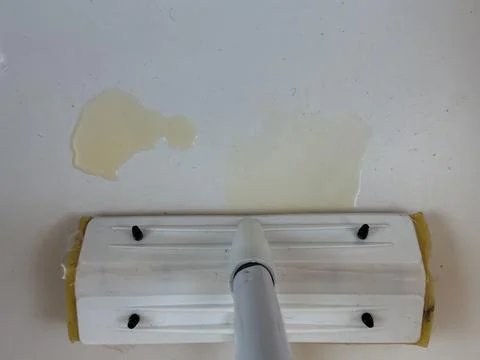 White space with sponge mop and spillage 写真素材