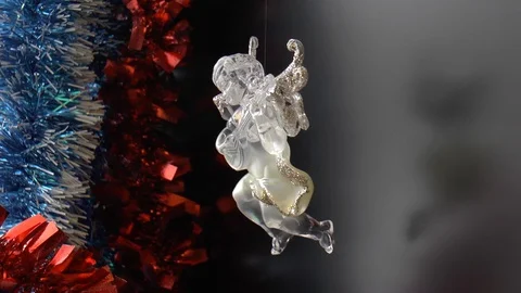 White sparkling figure of a cupid Stock Footage 100260692