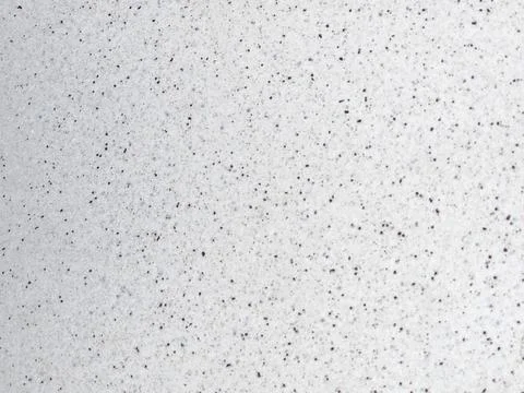White speckled artificial stone composite material texture background Stock Photos