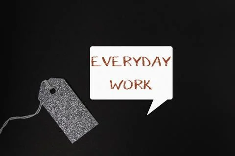 White speech bubble with everyday work text on a black background Foto stock