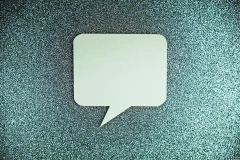 White Speech bubble mockup top view on silver glitter background Stock Photos