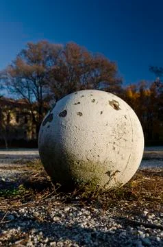 White sphere on the ground in park Stock Photos