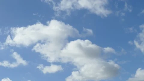 White spring clouds, blue sky, Germany Stock Footage 217442525