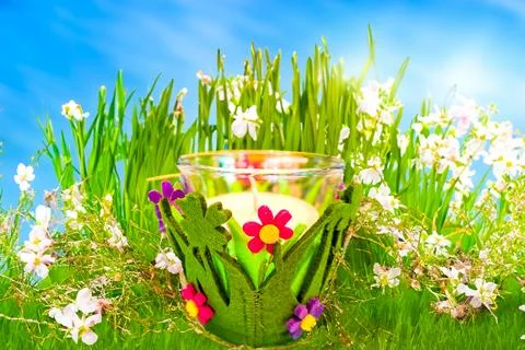 A white Spring style candle for Easter, Against the background of the spring sky Stock Illustration
