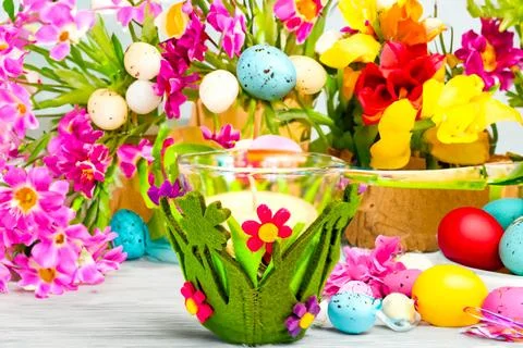 A white Spring style candle for Easter, Against the background of the Easters Stock Photos