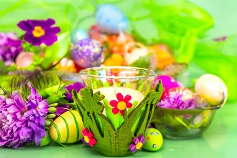 A white Spring style candle for Easter, Against the background of the Easters Stock Photos