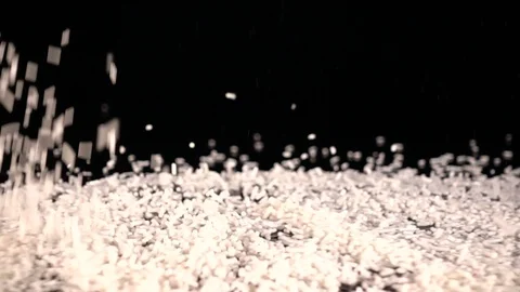 White Sprinkles falling in slow motion. 库存影片 88615649