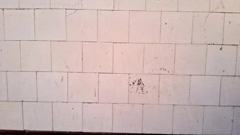 White square ceramic tiles with aged texture and dirty stained surfaces Photos