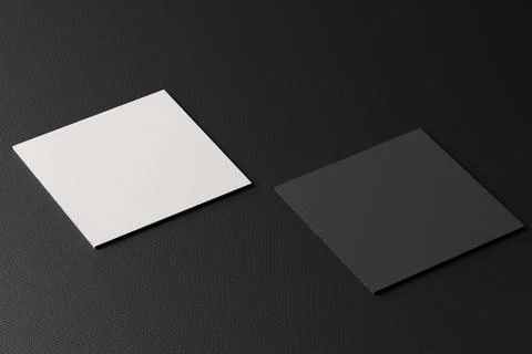 White square shape paper business card mockup on black modern fabric table .. Stock Photos