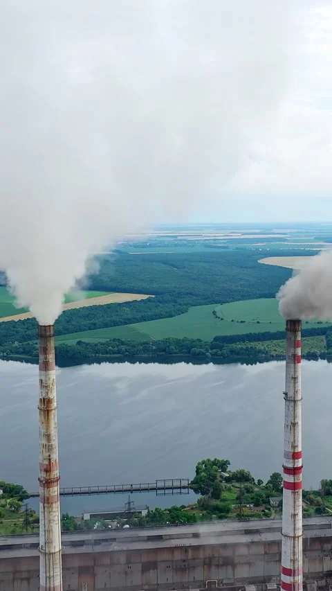 White stack of smoke coming out from large chimneys. Stock Footage 296232722