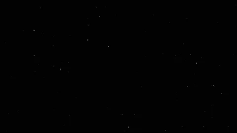White Star dust particles fly in slow motion in the air lingering slowly Loop Stock Footage 141302587