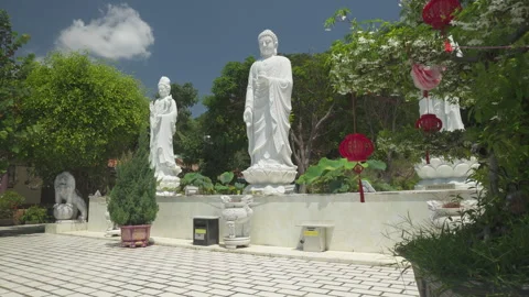 White statues of Buddha at Chua Da Bao, Nha Trang Stock Footage 328909362