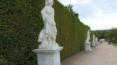 The white statues on the green borders in the castle Stock Footage 56202388