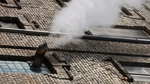White Steam going from vent on an old brick wall Stock Footage 138751048