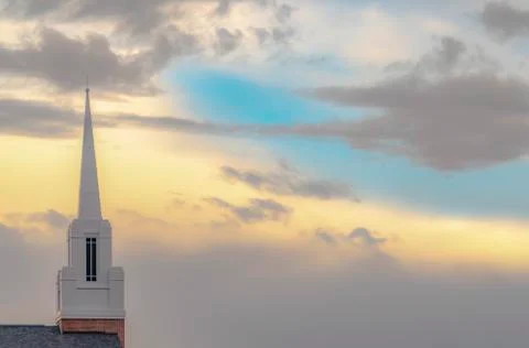 White steeple against cloudy sky in Utah Valley Stock Photos