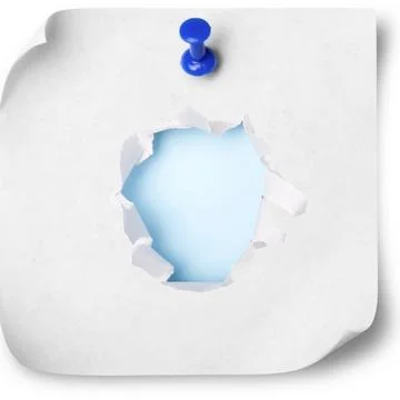 White Sticky Note with Blue Pushpin and Torn Center Hole Revealing Blue Backgrou Stock Photos