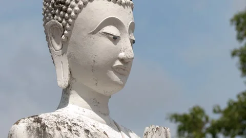 White Stone Buddha Statue with Praying Hands in Ayutthaya 動画素材 346664599