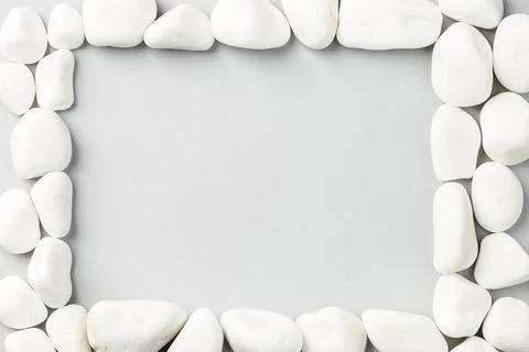 White stone frame on the grey background Stock Photos