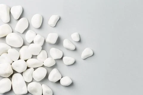 White stone on the grey background border Stock Photos