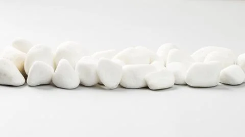White stone on the grey background border Stock Photos