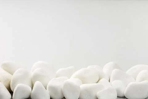 White stone on the grey background border Stock Photos
