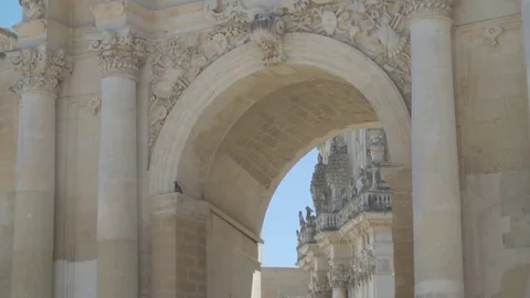White stone Monument's arch in south Italy Stock Footage 71505413