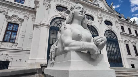 White Stone Sphinx Statue With Upper Belvedere Palace In Slow Motion Stock Footage 347949434