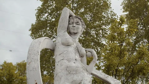 White stone statue in the park Stock Footage 248183309
