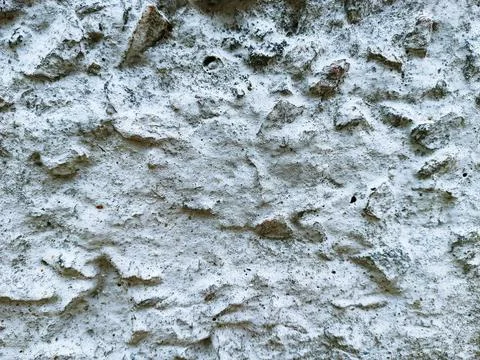 White stone texture. Part of a stone wall as texture or backdrop Stock Photos