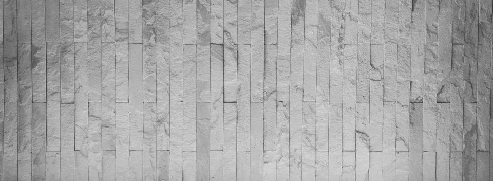 The white stone wall pattern texture background. Stock Photos