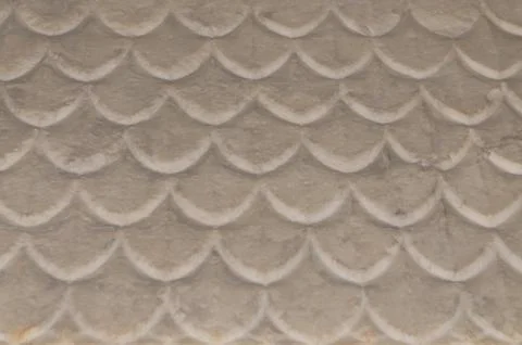 A white stone, wavy texture, background Fotos Stock