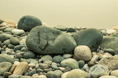 White Stone on a white background on the riverside Stock Photos