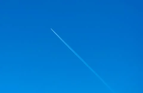 White streaks of a plane Stock-Fotos