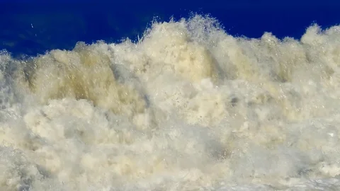 White Stream Water Falling Down Bursting on a blue background. Ecology Stock Footage 80931302